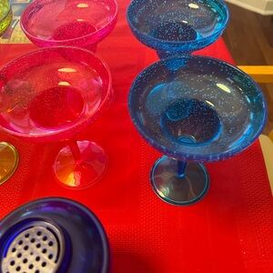 6 plastic margarita glasses and a shaker
